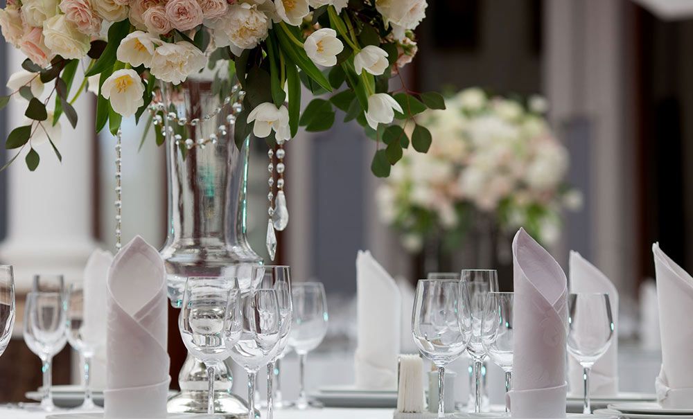 Beautiful table setting with floral centerpiece