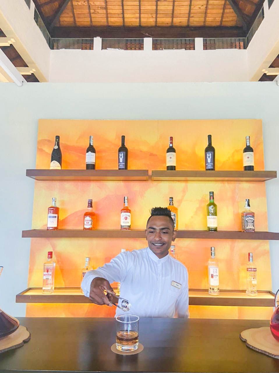 Bartender pouring a drink at Dumbara bar in Amaya Hills Kandy