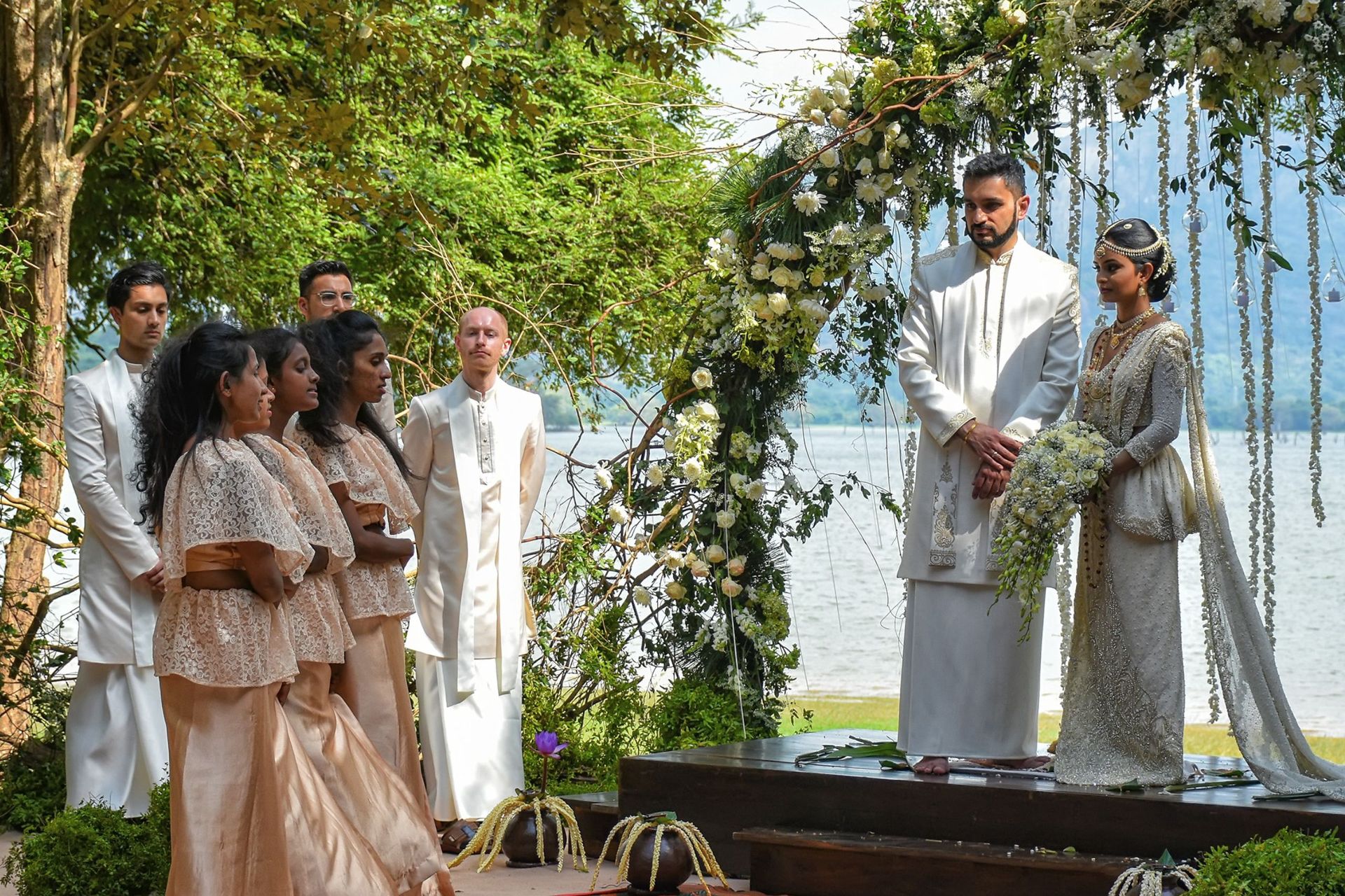 Outdoor wedding ceremony by the water at Amaya Lake Dambulla