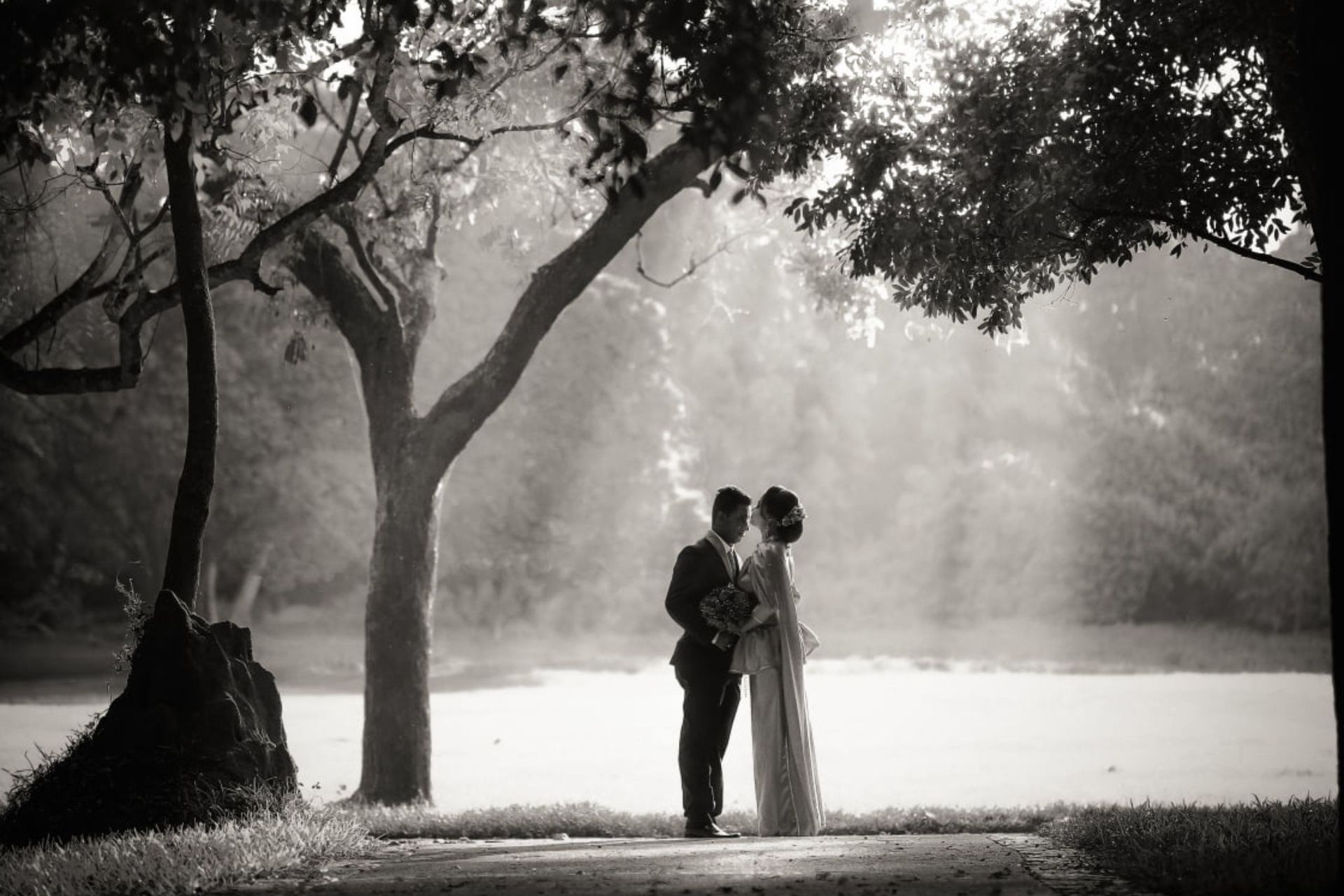 Scenic image of a couple on their wedding day at Amaya Lake Dambulla