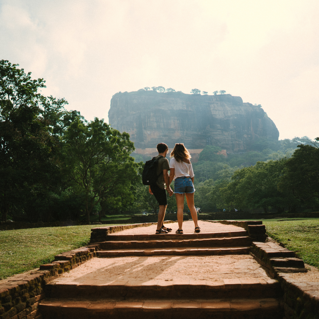 Couple looking at the Sigiriya rock in the distance