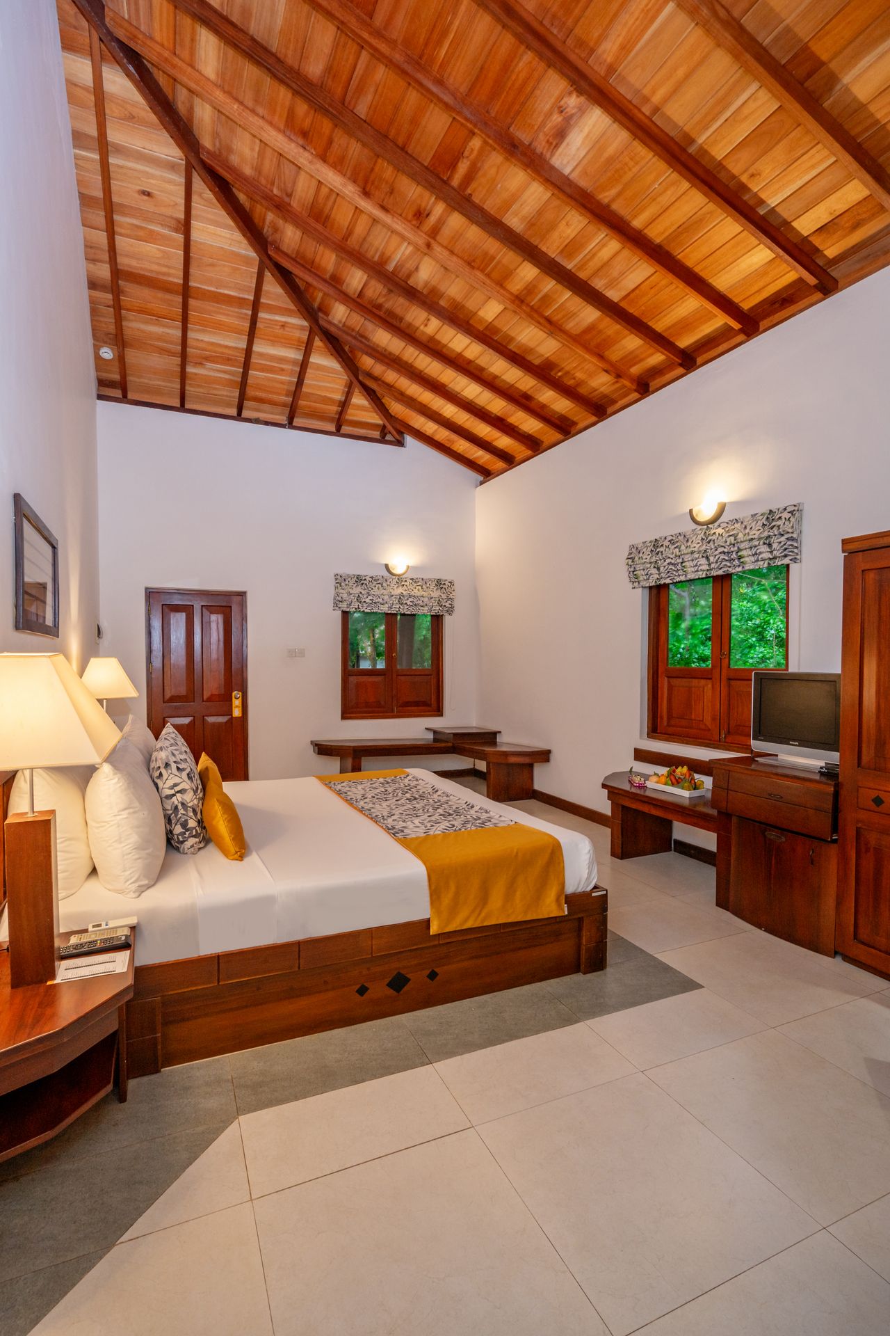 Spacious bedroom of a family villa at Amaya Lake Dambulla