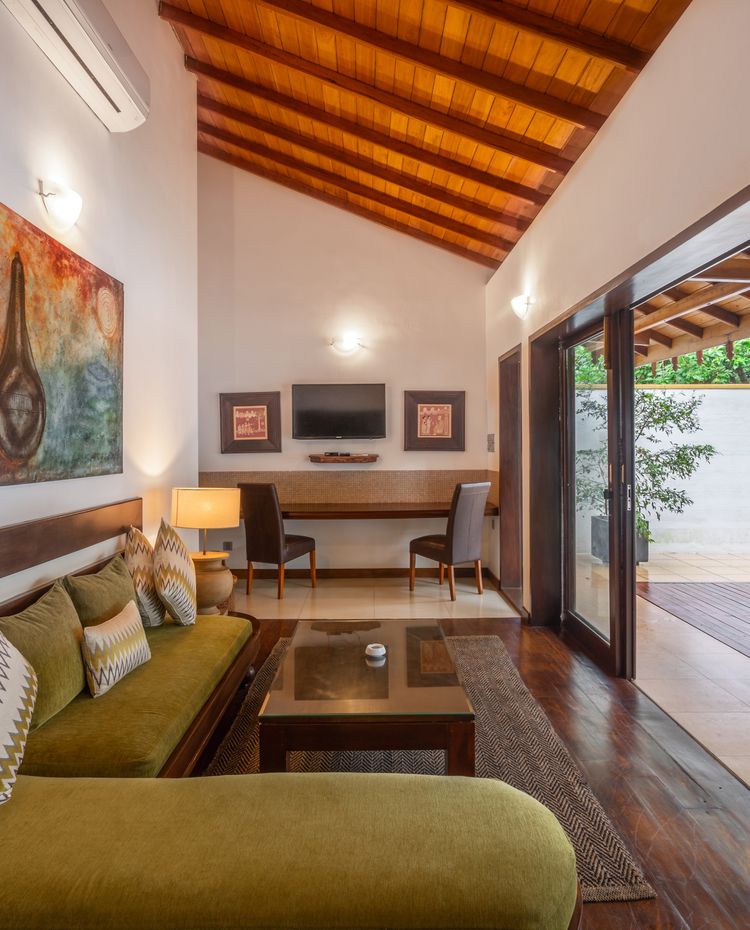 Sitting area of a deluxe suite with plunge pool at Amaya Lake Dambulla