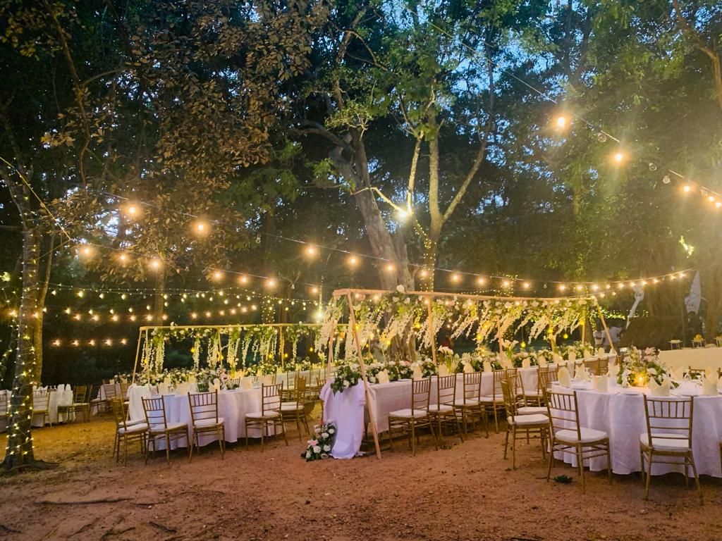 Elegant outdoor dinner setting under lights at Amaya Lake Dambulla
