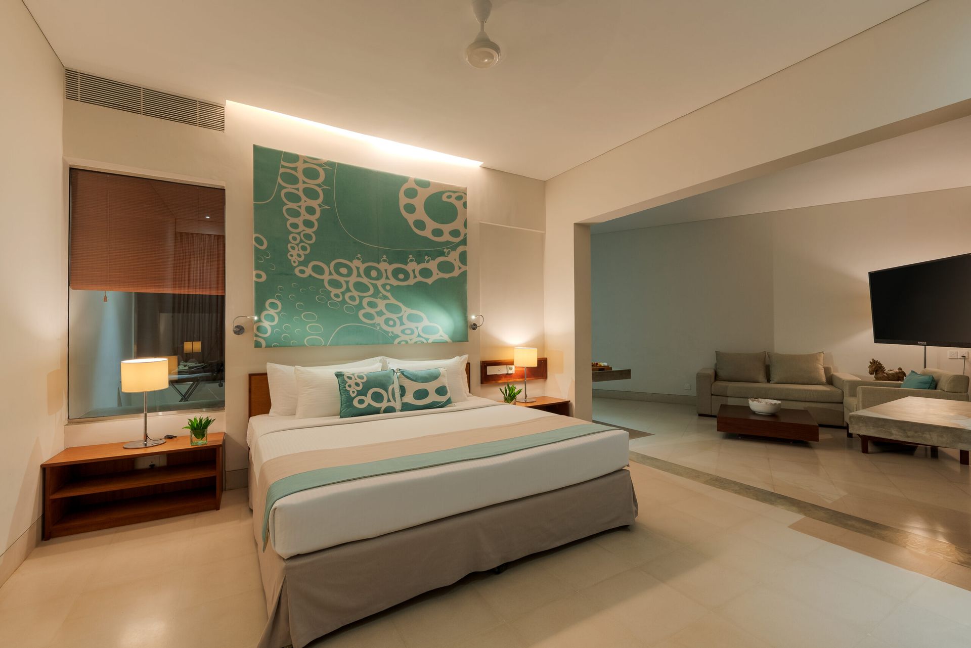 Bed space of a premium deluxe suite at Amaya Beach Pasikudah
